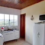 Apartamento Bela Vista - cozinha e suíte